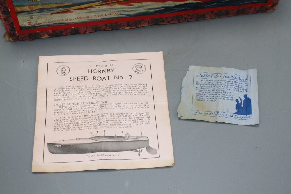 A Hornby tinplate clockwork No.2 Swift model speedboat, with red hull, boxed